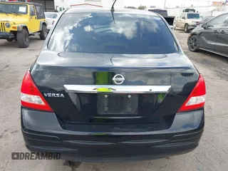 2009 Nissan Versa 1.8 S with VIN 3N1BC11E09L450167, listed as a IAAI auction lot 41711284 with 91,216 mi miles. Bid and sale history available at carsss.com. Image 16.