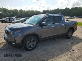2022 Honda Ridgeline RTL-E with VIN 5FPYK3F72NB000908, listed as a Copart auction lot 65631535 with 35,796 mi miles and Salvage title. Bid and sale history available at DreamBid. Image 1.