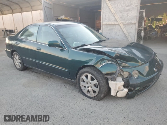 1999 Acura Integra with VIN JH4DB7665XS000928, listed as a Copart auction lot 80924344 with 198,981 mi miles and Salvage title. Bid and sale history available at DreamBid. Image 4.