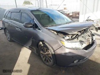 2016 Honda Odyssey Touring Elite with VIN 5FNRL5H99GB013372, listed as a IAAI auction lot 41194755 with 142,357 mi miles. Bid and sale history available at carsss.com. Image 1.
