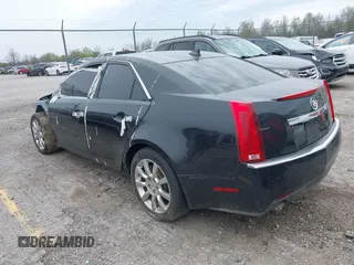 2009 Cadillac CTS AWD w/1SA with VIN 1G6DG577890126877, listed as a IAAI auction lot 42063927 with 117,444 mi miles. Bid and sale history available at carsss.com. Image 3.