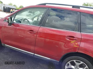 2017 Subaru Forester Touring z VIN JF2SJAWC8HH551644, wystawiony jako IAAI lot #42233209 z przebiegiem 108 199 mil mil oraz . Historia ofert i sprzedaży dostępna na DreamBid. Obrazek 14.