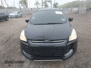 2014 Ford Escape Titanium with VIN 1FMCU9J90EUC24898, listed as a IAAI auction lot 42166523 with 152,464 mi miles and . Bid and sale history available at DreamBid. Image 12.