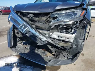 2020 Honda Pilot EX-L with VIN 5FNYF5H51LB020830, listed as a IAAI auction lot 42255746 with 60,503 mi miles and . Bid and sale history available at DreamBid. Image 6.