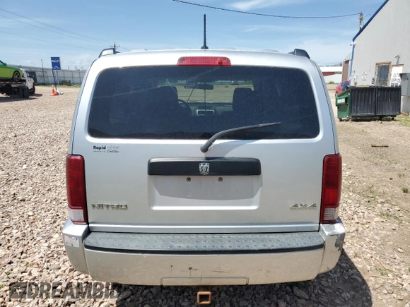 2008 Dodge Nitro SXT z VIN 1D8GU28K98W178732, wystawiony jako Copart lot #61411305 z przebiegiem 185 194 mil mil oraz Czysty tytuł • Clean title. Historia ofert i sprzedaży dostępna na DreamBid. Obrazek 6.