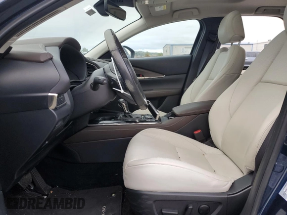2022 Mazda CX-30 Premium with VIN 3MVDMBDY1NM446064, listed as a Copart auction lot 46527505 with 20,742 mi miles and Salvage Title. Bid and sale history available at DreamBid. Image 7.