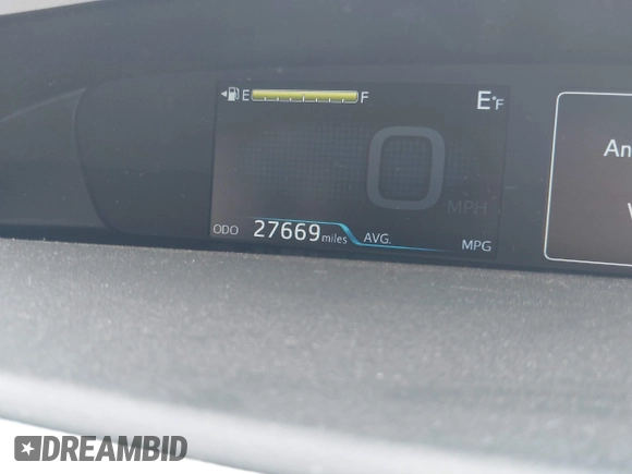 2019 Toyota Prius L Eco z VIN JTDKARFU3K3102222, wystawiony jako IAAI lot #42291403 z przebiegiem 27 669 mil mil oraz . Historia ofert i sprzedaży dostępna na DreamBid. Obrazek 14.