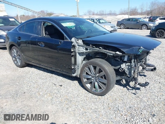 2019 Mazda 6 Grand Touring with VIN JM1GL1TY7K1501946, listed as a IAAI auction lot 41786545 with 118,800 mi miles and . Bid and sale history available at carsss.com. Image 1.