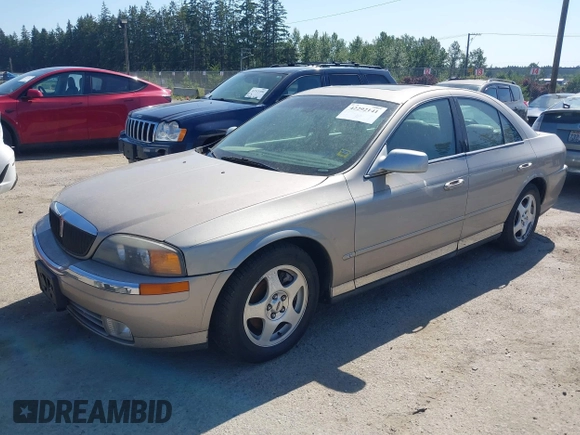 2000 Lincoln LS z VIN 1LNHM86S9YY852483, wystawiony jako IAAI lot #42292141 z przebiegiem 126 347 mil mil oraz . Historia ofert i sprzedaży dostępna na DreamBid. Obrazek 2.