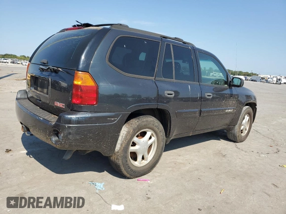 2004 GMC Envoy SLT with VIN 1GKDT13SX42423677, listed as a Copart auction lot 69012884 with Not Provided miles and Clean Title. Bid and sale history available at carsss.com. Image 3.