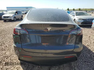 2024 Tesla Model Y Long Range with VIN 7SAYGDEE9RA221380, listed as a Copart auction lot 47516705 with 10,930 mi miles and Salvage Title. Bid and sale history available at DreamBid. Image 6.