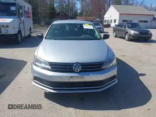 2015 Volkswagen Jetta Sedan 1.8T SE with VIN 3VWD17AJ0FM329783, listed as a IAAI auction lot 42142611 with 217,610 mi miles. Bid and sale history available at carsss.com. Image 13.