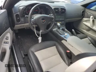 2012 Chevrolet Corvette 3LT с VIN 1G1YG2DW0C5100057, выставлен на аукционе Copart как лот 74807624 с пробегом 52 560 миль миль и Списание • Salvage title. История ставок и продаж доступна на DreamBid. Изображение 8.