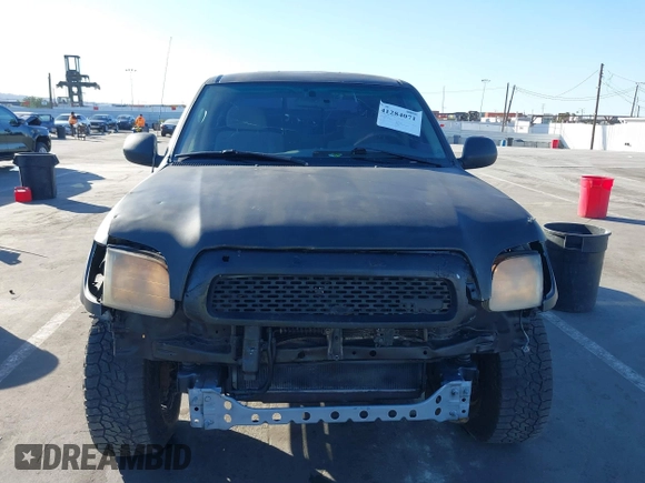 2000 Toyota Tundra SR5 with VIN 5TBRT3419YS114034, listed as a IAAI auction lot 41284071 with 200,797 mi miles and . Bid and sale history available at DreamBid. Image 6.