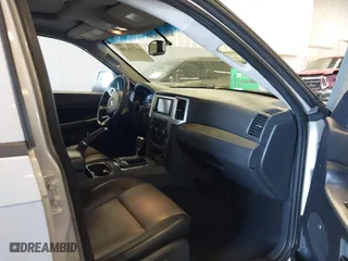2010 Jeep Grand Cherokee Laredo with VIN 1J4RR4GT9AC106381, listed as a IAAI auction lot 41723268 with 180,008 mi miles. Bid and sale history available at carsss.com. Image 5.