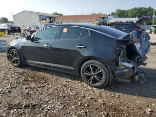 2015 Kia Optima EX z VIN 5XXGN4A7XFG383584, wystawiony jako Copart lot #63338845 z przebiegiem 156 705 mil mil oraz Szkoda całkowita • Salvage title. Historia ofert i sprzedaży dostępna na DreamBid. Obrazek 2.