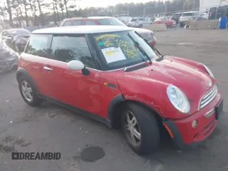 2006 MINI Hardtop with VIN WMWRC33516TJ77300, listed as a IAAI auction lot 41915787 with 125,241 mi miles and . Bid and sale history available at DreamBid. Image 1.