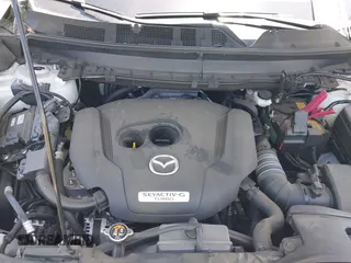 2023 Mazda CX-9 Touring Plus with VIN JM3TCBAY7P0636047, listed as a IAAI auction lot 42309618 with 20,821 mi miles and . Bid and sale history available at DreamBid. Image 10.