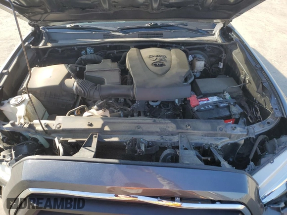 2020 Toyota Tacoma SR5 z VIN 3TMAZ5CN8LM126431, wystawiony jako Copart lot #56073545 z przebiegiem 27 612 mil mil oraz Szkoda całkowita • Salvage title. Historia ofert i sprzedaży dostępna na DreamBid. Obrazek 11.