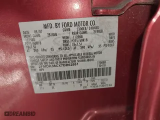 2007 Ford Edge SEL with VIN 2FMDK38CX7BB62881, listed as a IAAI auction lot 41557253 with 233,694 mi miles. Bid and sale history available at carsss.com. Image 9.