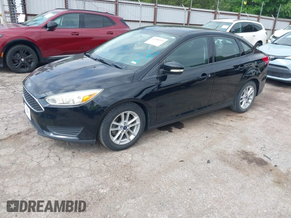 2016 Ford Focus SE z VIN 1FADP3F2XGL312445, wystawiony jako IAAI lot #42288210 z przebiegiem 64 115 mil mil oraz . Historia ofert i sprzedaży dostępna na DreamBid. Obrazek 2.