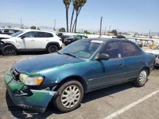 1994 Toyota Corolla Deluxe with VIN JT2AE09B4R0071945, listed as a Copart auction lot 65052514 with 177,589 mi miles and Salvage title. Bid and sale history available at DreamBid. Image 1.