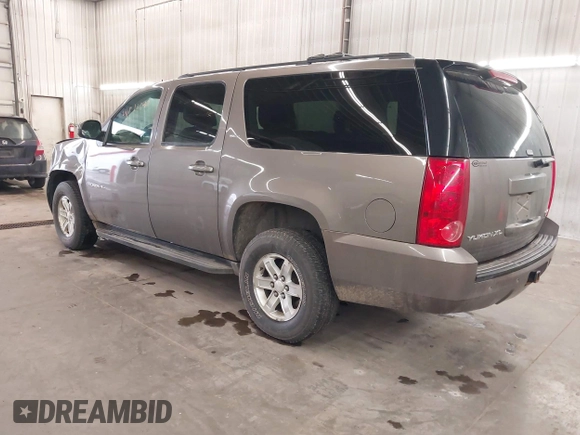 2013 GMC Yukon XL SLT with VIN 1GKS2KE71DR213758, listed as a IAAI auction lot 41713240 with 193,611 mi miles. Bid and sale history available at carsss.com. Image 3.