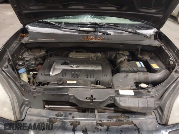 2006 Hyundai Tucson GL with VIN KM8JM12B26U325338, listed as a IAAI auction lot 41809578 with 127,210 mi miles. Bid and sale history available at carsss.com. Image 10.