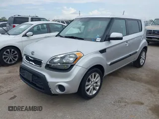 2012 Kia Soul + with VIN KNDJT2A60C7377305, listed as a IAAI auction lot 41902069 with 76,217 mi miles. Bid and sale history available at carsss.com. Image 2.