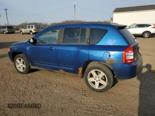 2010 Jeep Compass North Edition with VIN 1J4NF4FB2AD575774, listed as a Copart auction lot 52617805 with 130,645 mi miles and Clean Title. Bid and sale history available at carsss.com. Image 2.