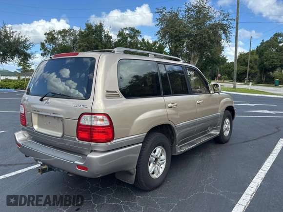 1998 Lexus LX 470 z VIN JT6HT00W7W0008417, wystawiony jako Copart lot #79324334 z przebiegiem 183 911 mil mil oraz Czysty tytuł • Clean title. Historia ofert i sprzedaży dostępna na DreamBid. Obrazek 4.