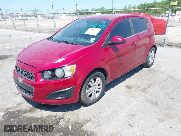 2016 Chevrolet Sonic LT with VIN 1G1JC6SH7G4127373, listed as a IAAI auction lot 41970423 with 130,440 mi miles. Bid and sale history available at carsss.com. Image 2.