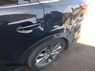 2019 Mazda CX-9 Grand Touring with VIN JM3TCADY4K0326730, listed as a IAAI auction lot 41745638 with 107,137 mi miles. Bid and sale history available at carsss.com. Image 6.