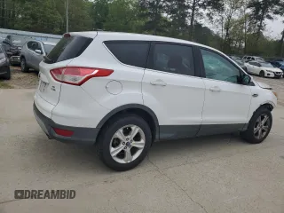 2014 Ford Escape SE with VIN 1FMCU9GX8EUA54151, listed as a Copart auction lot 51424195 with 173,161 mi miles and Salvage title. Bid and sale history available at DreamBid. Image 3.