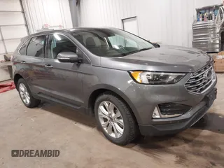 2022 Ford Edge Titanium with VIN 2FMPK4K98NBA77082, listed as a IAAI auction lot 41985006 with 49,531 mi miles and . Bid and sale history available at DreamBid. Image 1.