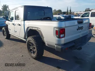 2022 Jeep Gladiator Willys with VIN 1C6HJTAG4NL132558, listed as a IAAI auction lot 41626851 with 28,251 mi miles and . Bid and sale history available at DreamBid. Image 3.