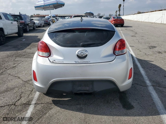 2014 Hyundai Veloster with VIN KMHTC6AD2EU186726, listed as a Copart auction lot 43993215 with 120,591 mi miles and Salvage Title. Bid and sale history available at carsss.com. Image 6.