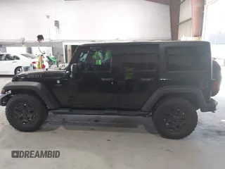 2017 Jeep Wrangler Unlimited Sport with VIN 1C4HJWDG2HL557576, listed as a IAAI auction lot 42712859 with 86,280 mi miles and . Bid and sale history available at DreamBid. Image 14.