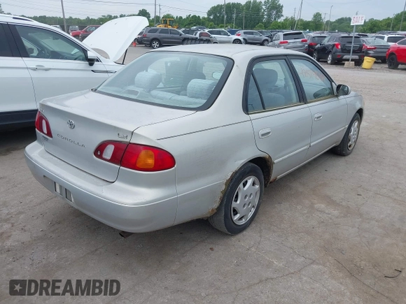 1999 Toyota Corolla VE z VIN 2T1BR12E7XC154444, wystawiony jako IAAI lot #42514069 z przebiegiem 209 377 mil mil oraz . Historia ofert i sprzedaży dostępna na DreamBid. Obrazek 4.