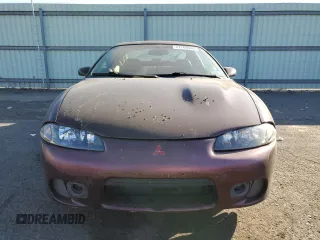 1999 Mitsubishi Eclipse with VIN 4A3AK44Y1XE074155, listed as a Copart auction lot 77143944 with 105,262 mi miles and Clean Title. Bid and sale history available at DreamBid. Image 5.