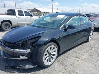 2022 Tesla Model 3 with VIN 5YJ3E1EA4NF316127, listed as a IAAI auction lot 41939191 with 30,857 mi miles. Bid and sale history available at carsss.com. Image 22.