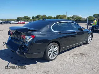 2018 BMW 7 Series 750i with VIN WBA7F0C54JGM22900, listed as a IAAI auction lot 41673673 with 66,264 mi miles. Bid and sale history available at carsss.com. Image 4.