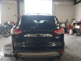 2015 Ford Escape Titanium with VIN 1FMCU9J98FUC70495, listed as a IAAI auction lot 41978543 with 129,974 mi miles. Bid and sale history available at carsss.com. Image 16.