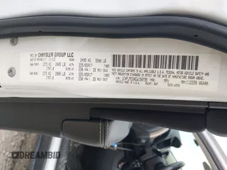 2014 Jeep Cherokee Latitude with VIN 1C4PJMCSXEW150735, listed as a IAAI auction lot 42020944 with 76,303 mi miles and . Bid and sale history available at carsss.com. Image 9.