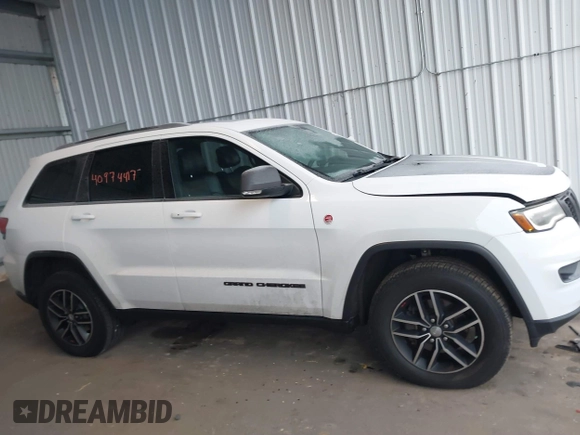 2018 Jeep Grand Cherokee Trailhawk with VIN 1C4RJFLGXJC264438, listed as a IAAI auction lot 40974417 with 117,717 mi miles and . Bid and sale history available at DreamBid. Image 13.
