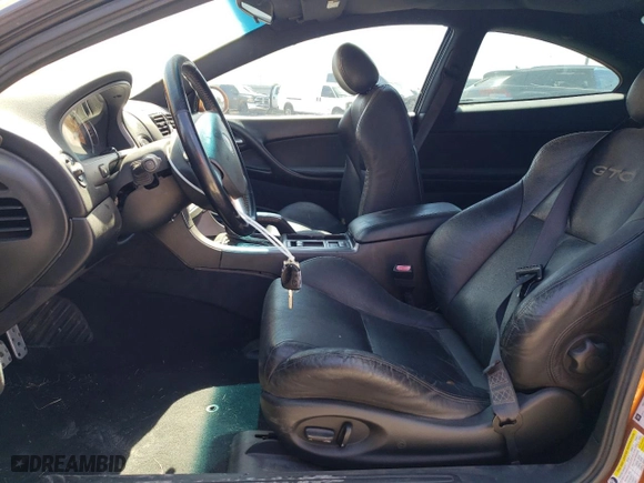 2006 Pontiac GTO with VIN 6G2VX12U76L521089, listed as a Copart auction lot 73374044 with 87,963 mi miles and Salvage Title. Bid and sale history available at carsss.com. Image 7.