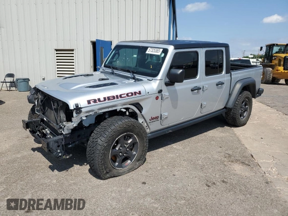 2022 Jeep Gladiator Rubicon z VIN 1C6JJTBG6NL104521, wystawiony jako Copart lot #57325365 z przebiegiem 31 498 mil mil oraz Szkoda całkowita • Salvage title. Historia ofert i sprzedaży dostępna na DreamBid. Obrazek 1.