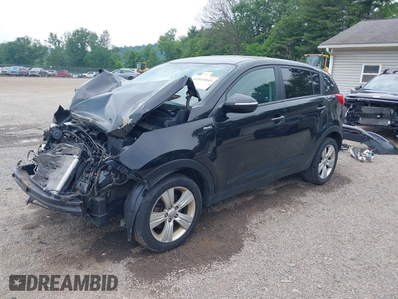 2013 Kia Sportage LX z VIN KNDPBCA28D7411444, wystawiony jako IAAI lot #42415041 z przebiegiem 150 524 mil mil oraz . Historia ofert i sprzedaży dostępna na DreamBid. Obrazek 20.