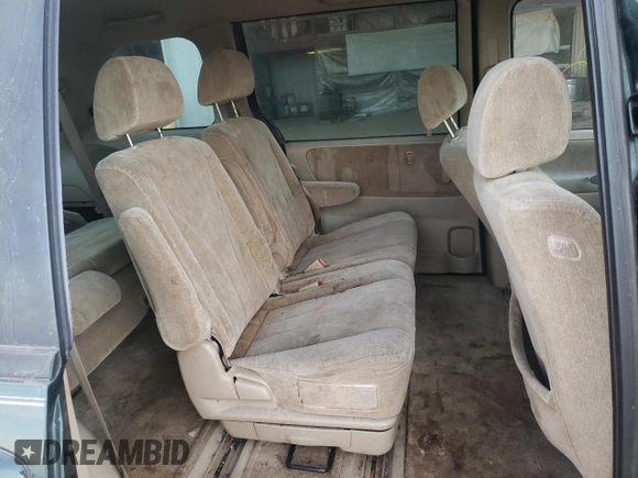 2000 Mazda MPV DX z VIN JM3LW28G8Y0106384, wystawiony jako Copart lot #66537813 z przebiegiem 223 272 mil mil oraz Szkoda całkowita • Salvage title. Historia ofert i sprzedaży dostępna na DreamBid. Obrazek 6.