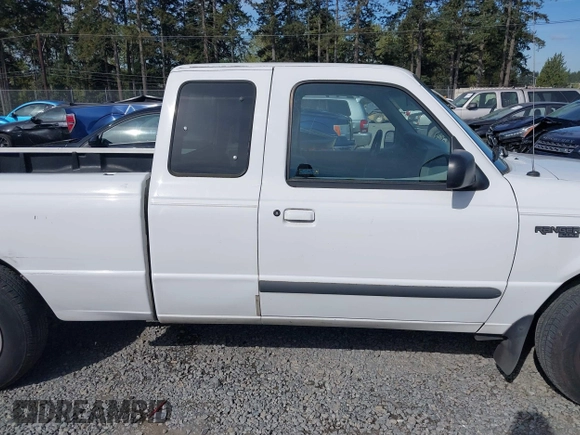 1999 Ford Ranger XLT with VIN 1FTYR14X0XPA65325, listed as a IAAI auction lot 42009611 with 218,657 mi miles. Bid and sale history available at carsss.com. Image 14.